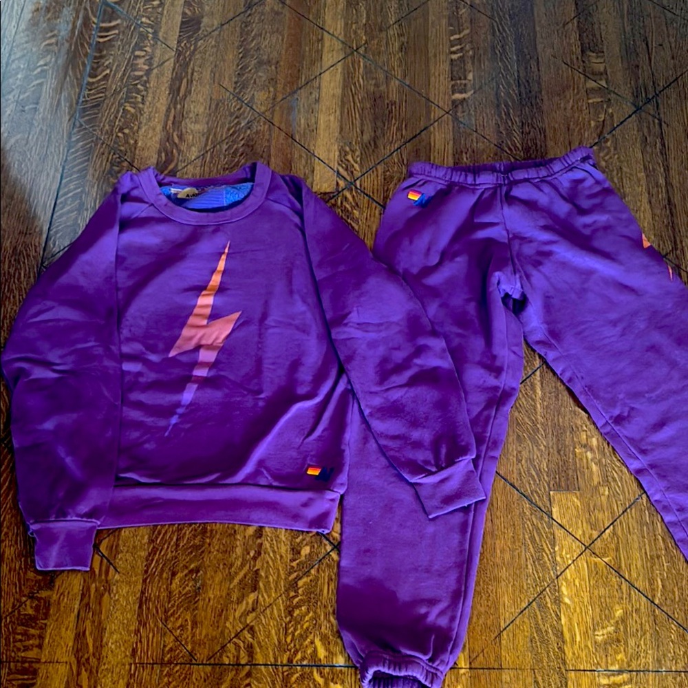 Aviator Nation Purple set top size medium pants xsmall
Fits like a small